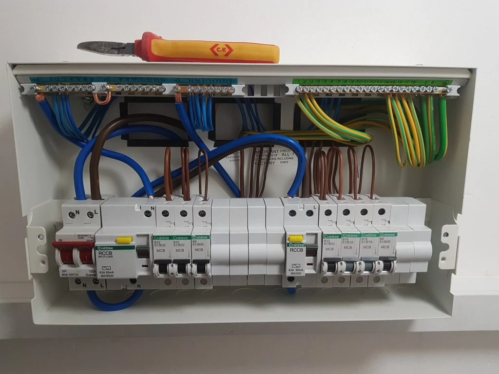 electrical consumer unit with cable cutters on top installed by Shrewsbury electrician