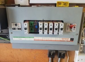 old metal fusebox in need of upgrade, found during private landlord electrical safety inspection.