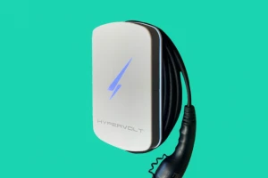 white Hypervolt EV charger on green background